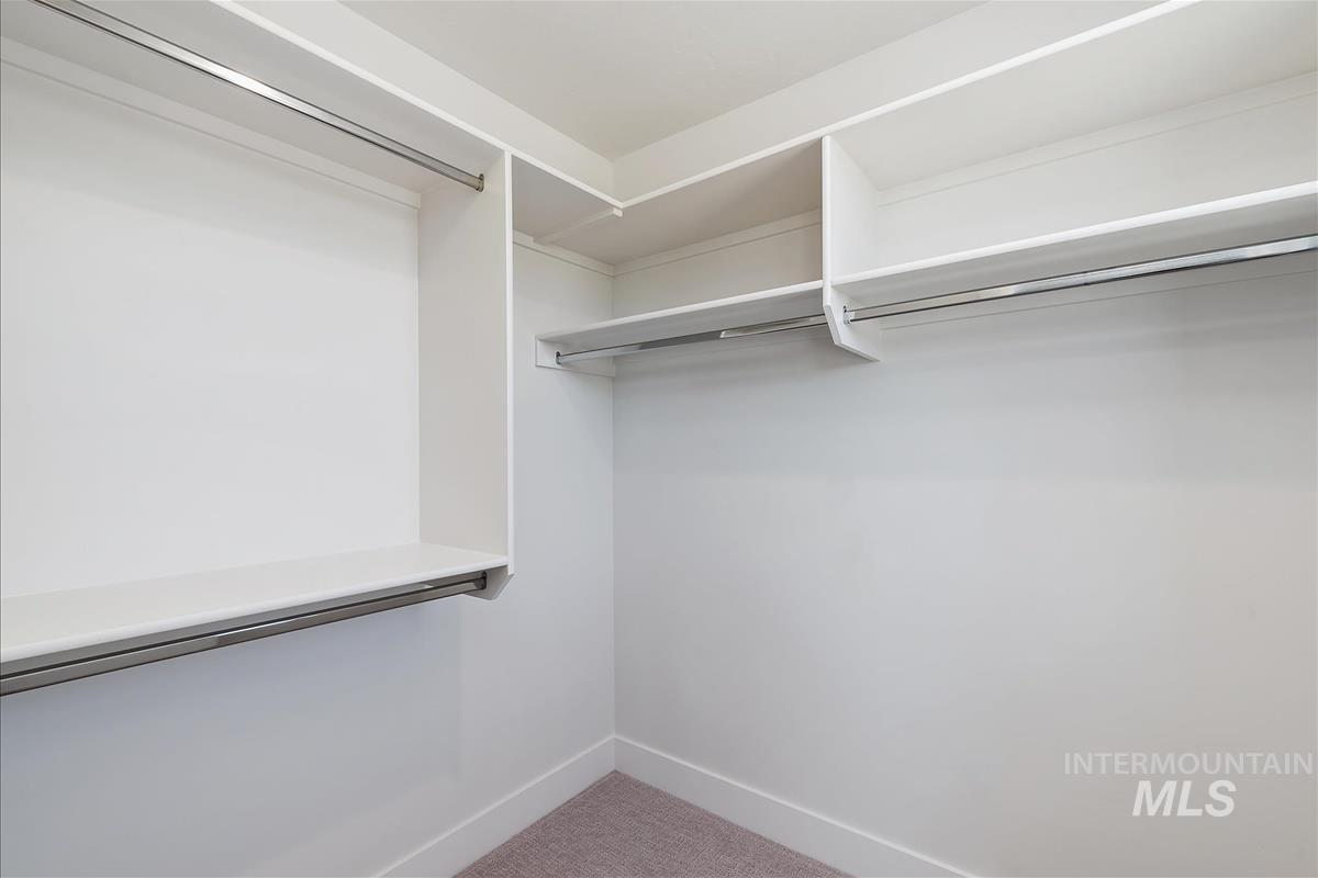 1703 South Federal Way Boise, ID 83705 - Photo 23 of 38 Walk in closet with light colored carpet