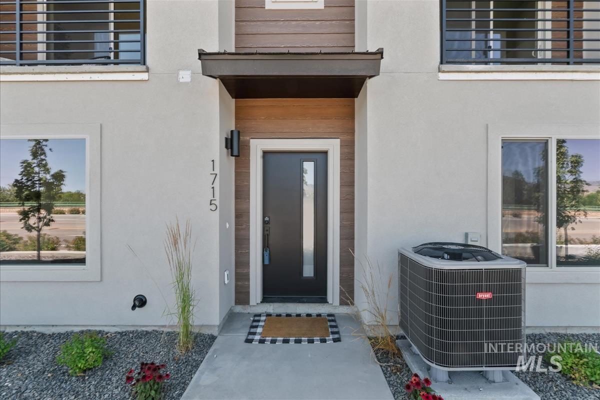 1703 South Federal Way Boise, ID 83705 - Photo 31 of 38 View of exterior entry featuring stucco siding