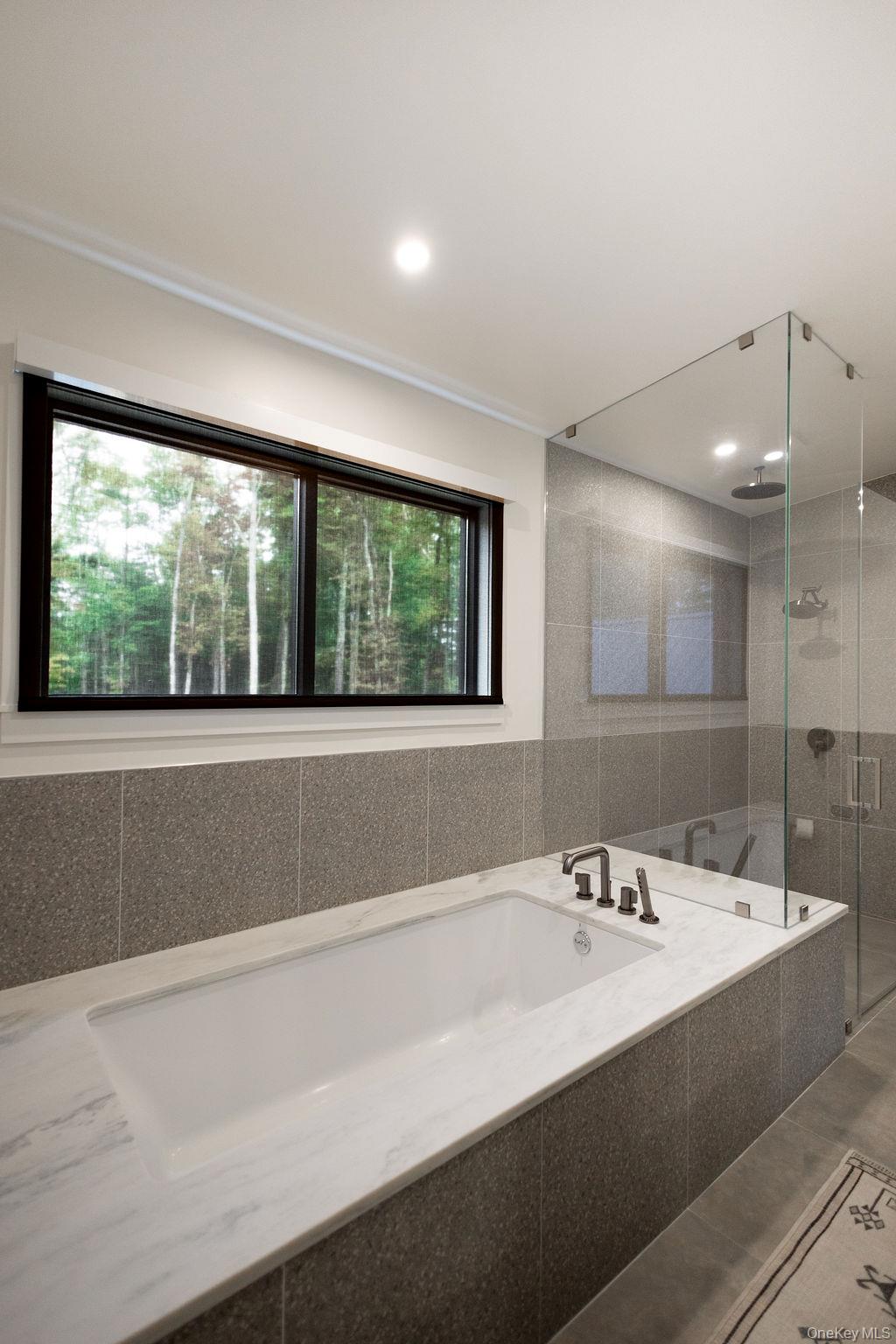 72 Van Tine Road Kerhonkson, NY 12446 - Photo 16 of 29 Bathroom with a bath and a stall shower