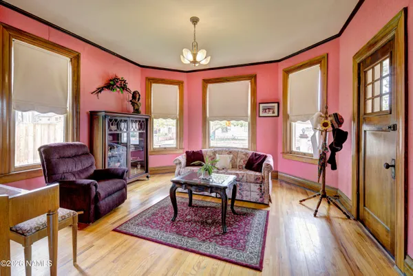 a room with furniture and a lamp on table