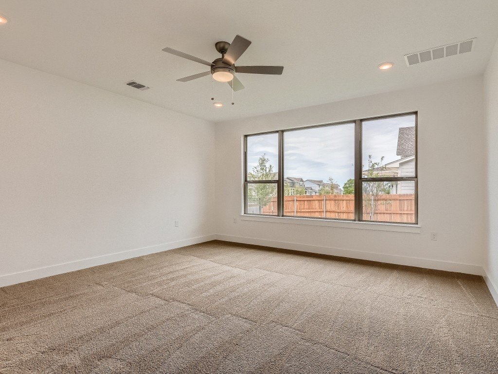 9101 Spire View Austin, TX 78744 - Photo 15 of 29 a view of an empty room with a window