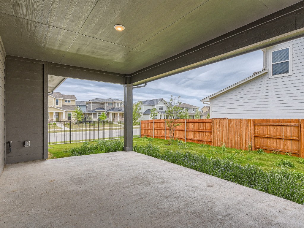 9101 Spire View Austin, TX 78744 - Photo 29 of 29 a view of a backyard with porch