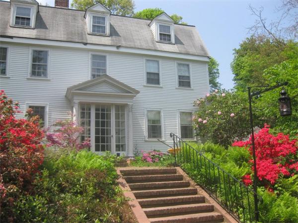 144 Nashoba Road Concord, MA 01742 - Photo 1 of 10 a front view of a house with a yard