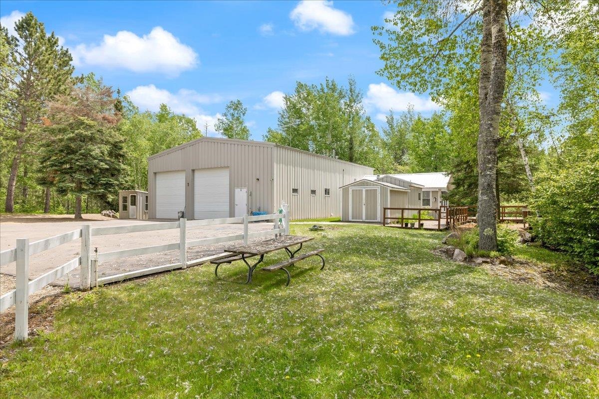 1317 Highway 21 North Ely, MN 55731 - Photo 35 of 36 View of yard featuring an outdoor structure and a garage