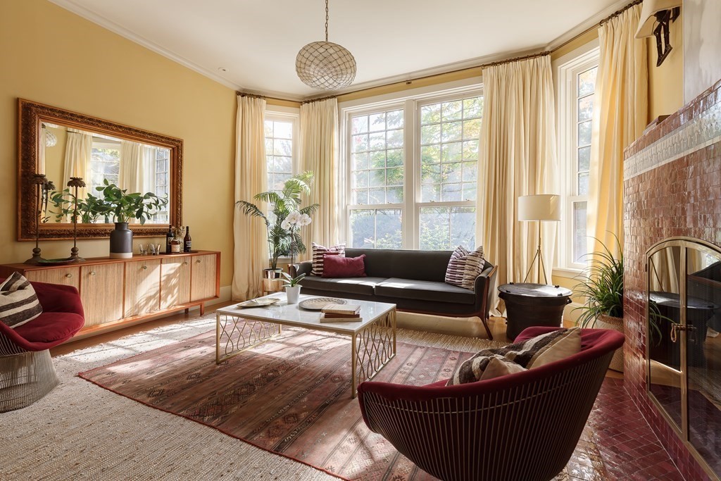 11 Hemlock Road Cambridge, MA 02138 - Photo 15 of 35 a living room with furniture and a large window