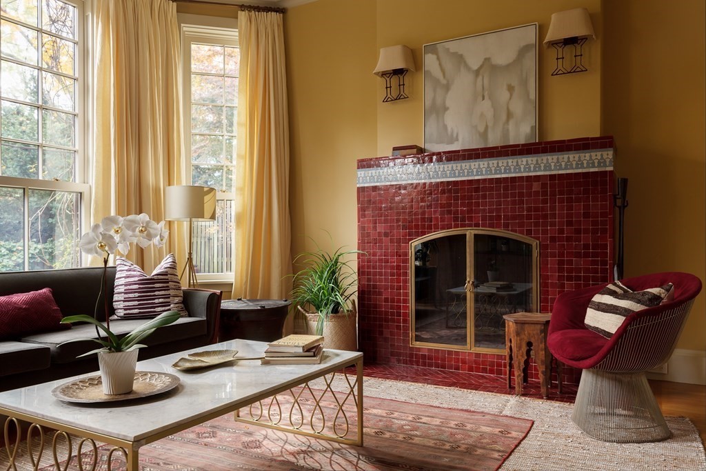 11 Hemlock Road Cambridge, MA 02138 - Photo 16 of 35 a living room with furniture and a fireplace