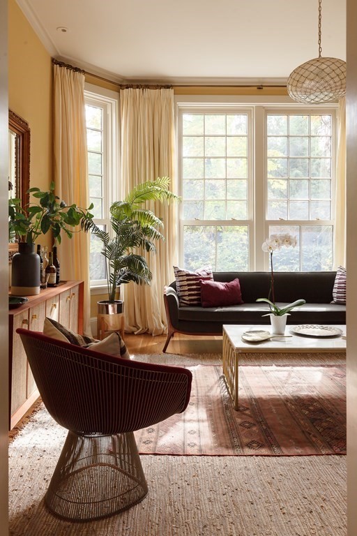 11 Hemlock Road Cambridge, MA 02138 - Photo 17 of 35 a living room with furniture and a large window