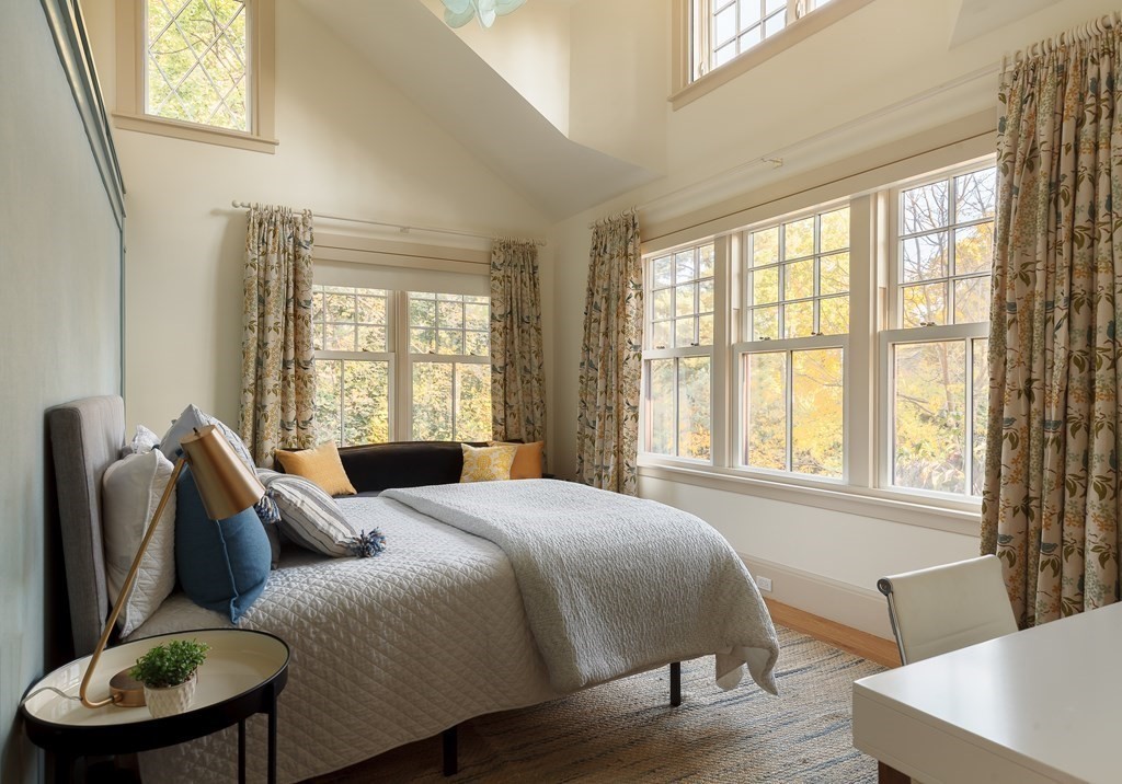 11 Hemlock Road Cambridge, MA 02138 - Photo 21 of 35 a bedroom with a bed a couch and a window