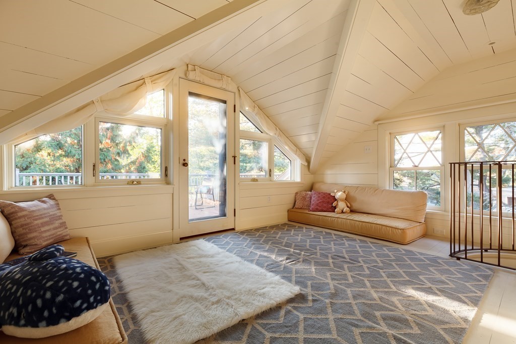 11 Hemlock Road Cambridge, MA 02138 - Photo 26 of 35 a bedroom with furniture and a large window