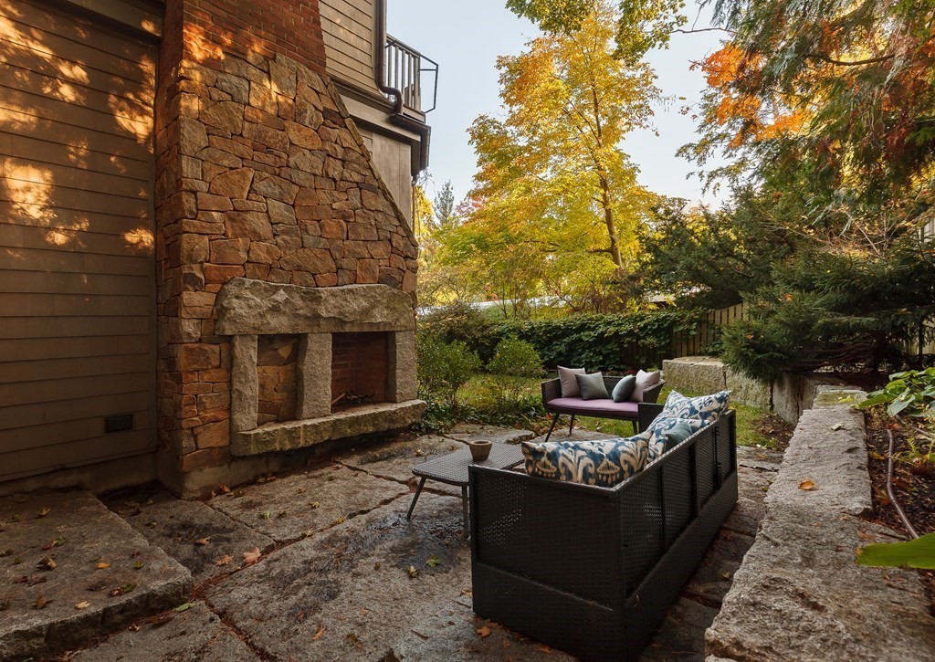 11 Hemlock Road Cambridge, MA 02138 - Photo 34 of 35 a view of a patio with couches and a fire pit and a fire pit