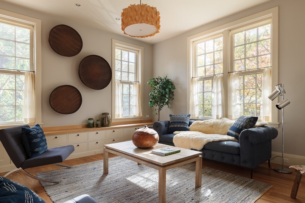 11 Hemlock Road Cambridge, MA 02138 - Photo 5 of 35 a living room with furniture a window and a mirror