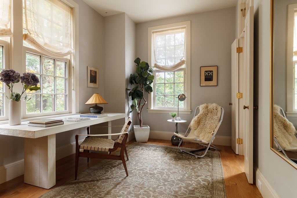 11 Hemlock Road Cambridge, MA 02138 - Photo 7 of 35 a view of a workspace with furniture and a window
