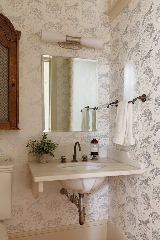 11 Hemlock Road Cambridge, MA 02138 - Photo 8 of 35 a bathroom with a sink and a mirror