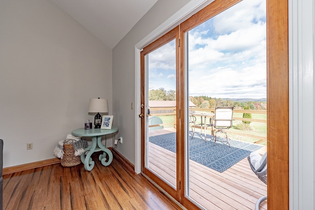 162 Chestnut Plain Road Whately, MA 01093 - Photo 11 of 42 a view of a room with wooden floor and city view