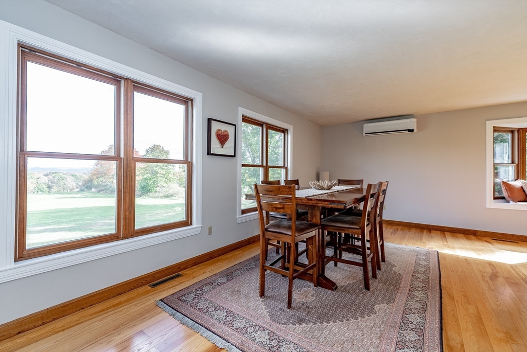 162 Chestnut Plain Road Whately, MA 01093 - Photo 13 of 42 a view of a dining room with furniture and a window