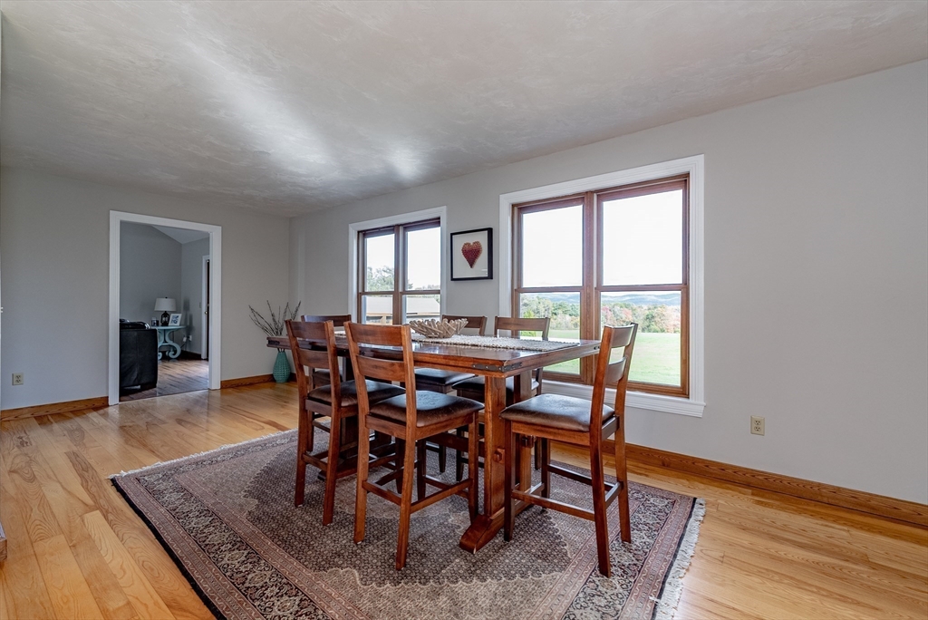 162 Chestnut Plain Road Whately, MA 01093 - Photo 14 of 42 a view of a dining room with furniture
