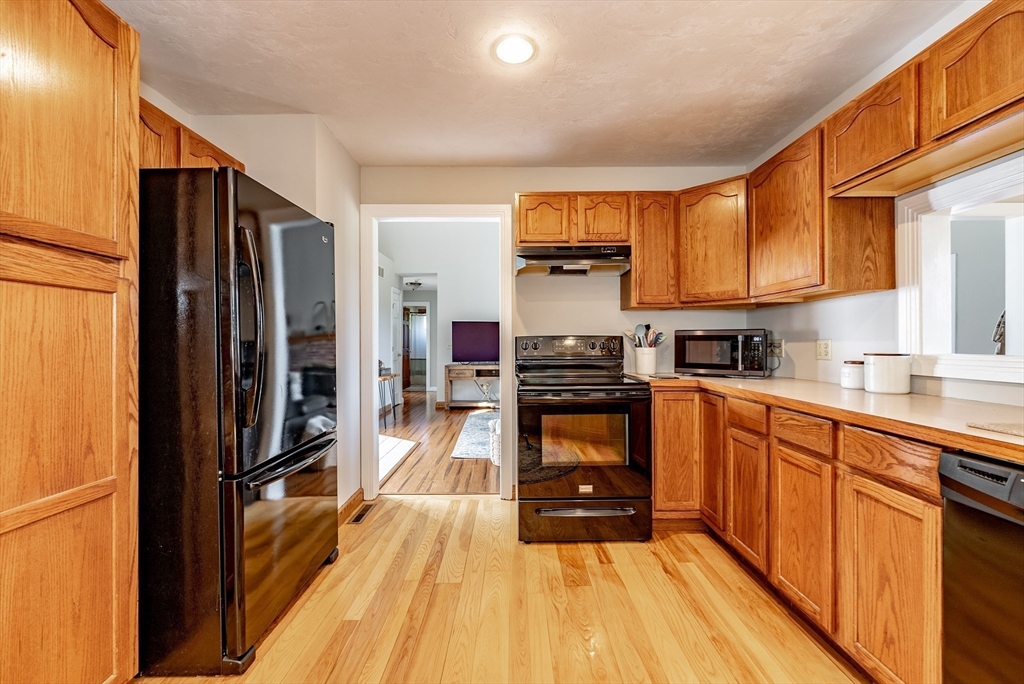 162 Chestnut Plain Road Whately, MA 01093 - Photo 19 of 42 a kitchen with stainless steel appliances a refrigerator stove and sink