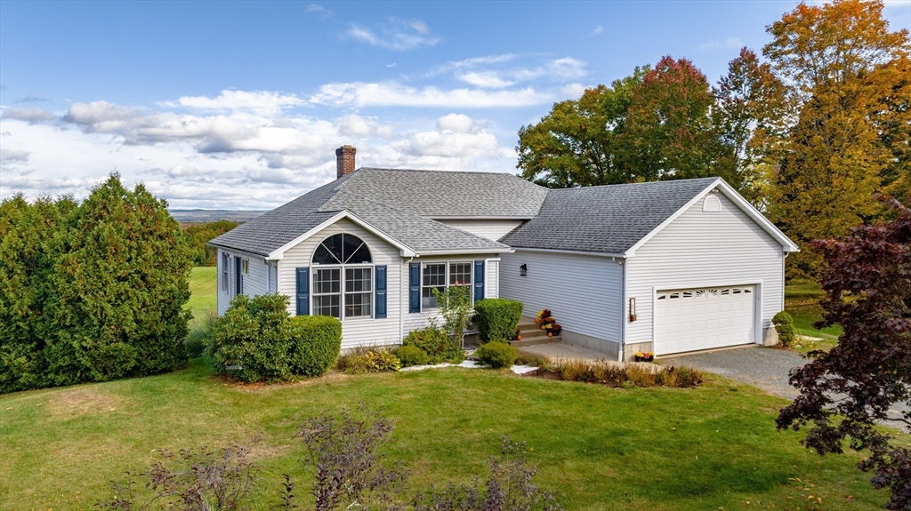 162 Chestnut Plain Road Whately, MA 01093 - Photo 2 of 42 a view of a house with a yard and potted plants