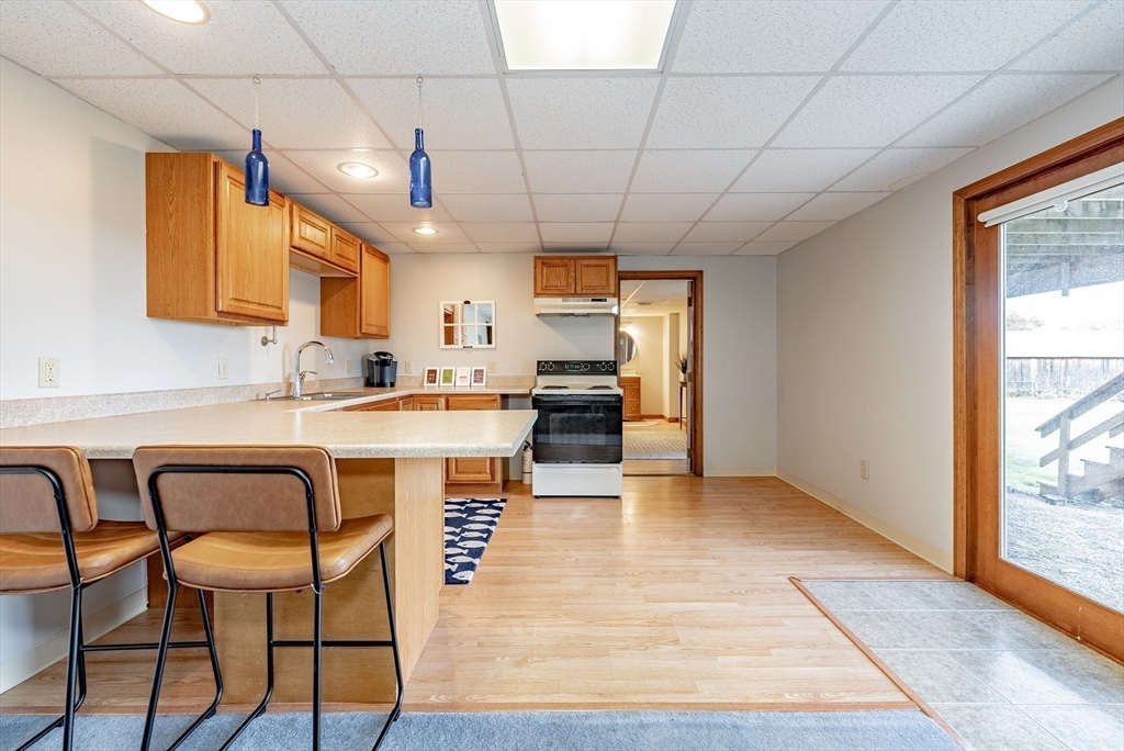 162 Chestnut Plain Road Whately, MA 01093 - Photo 31 of 42 a kitchen with a sink cabinets and window