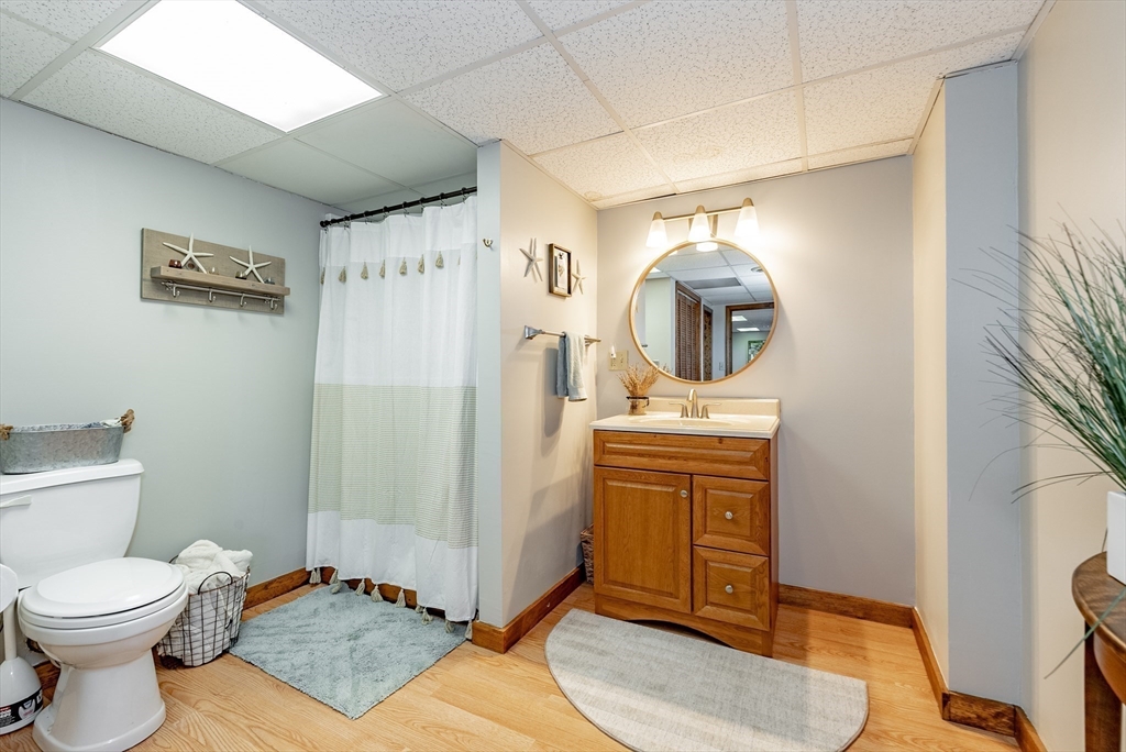 162 Chestnut Plain Road Whately, MA 01093 - Photo 37 of 42 a bathroom with a toilet a sink and mirror