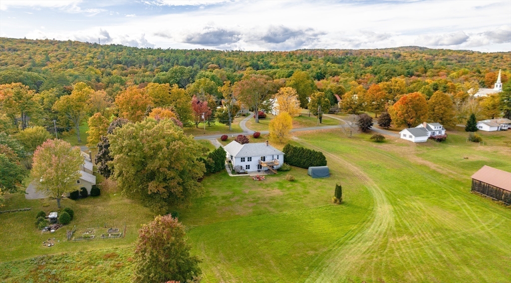 162 Chestnut Plain Road Whately, MA 01093 - Photo 4 of 42 a view of a lake with houses