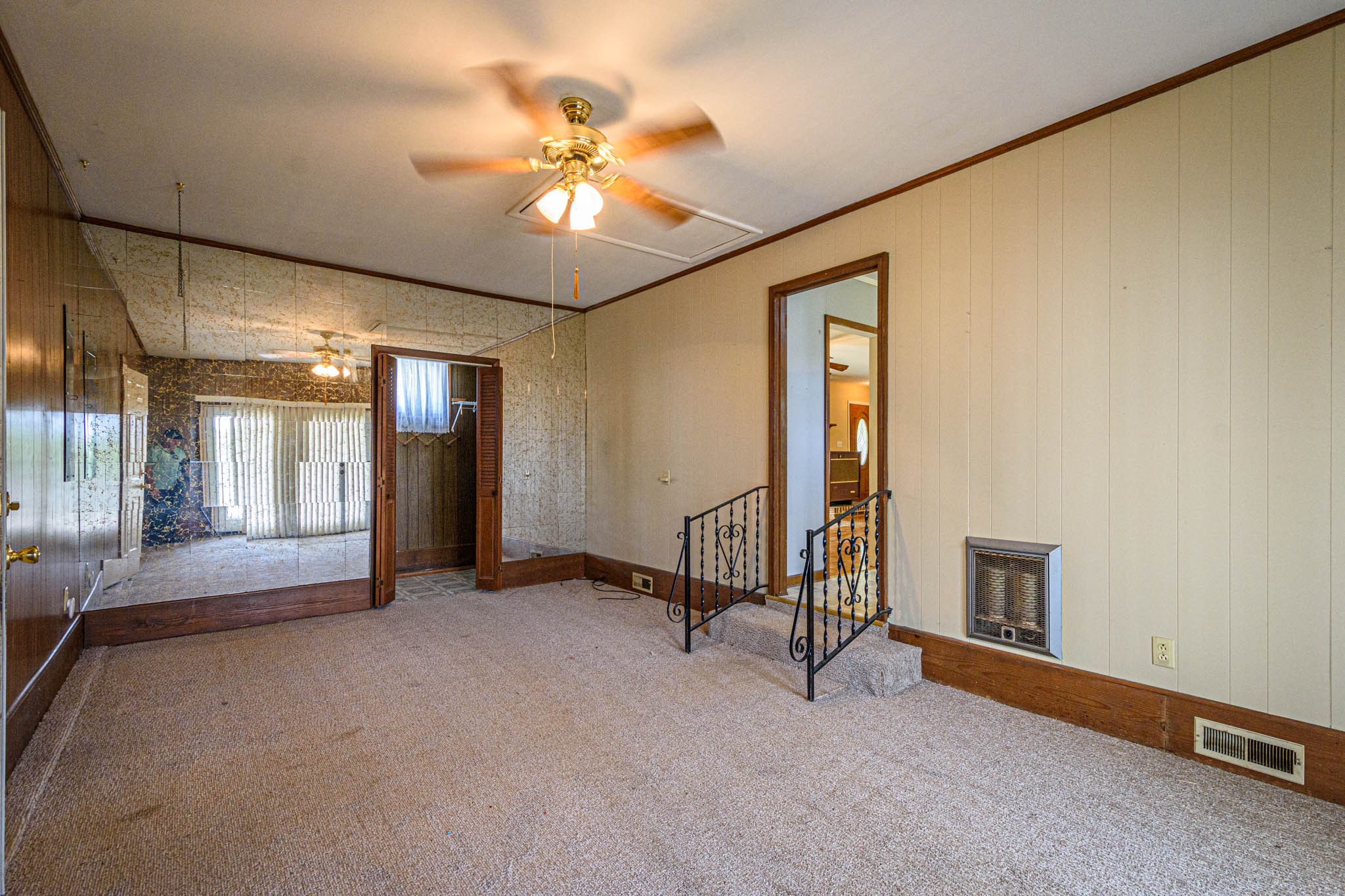 657 Prospect Road Pulaski, TN 38478 - Photo 15 of 50 a view of an empty room with window and chandelier fan