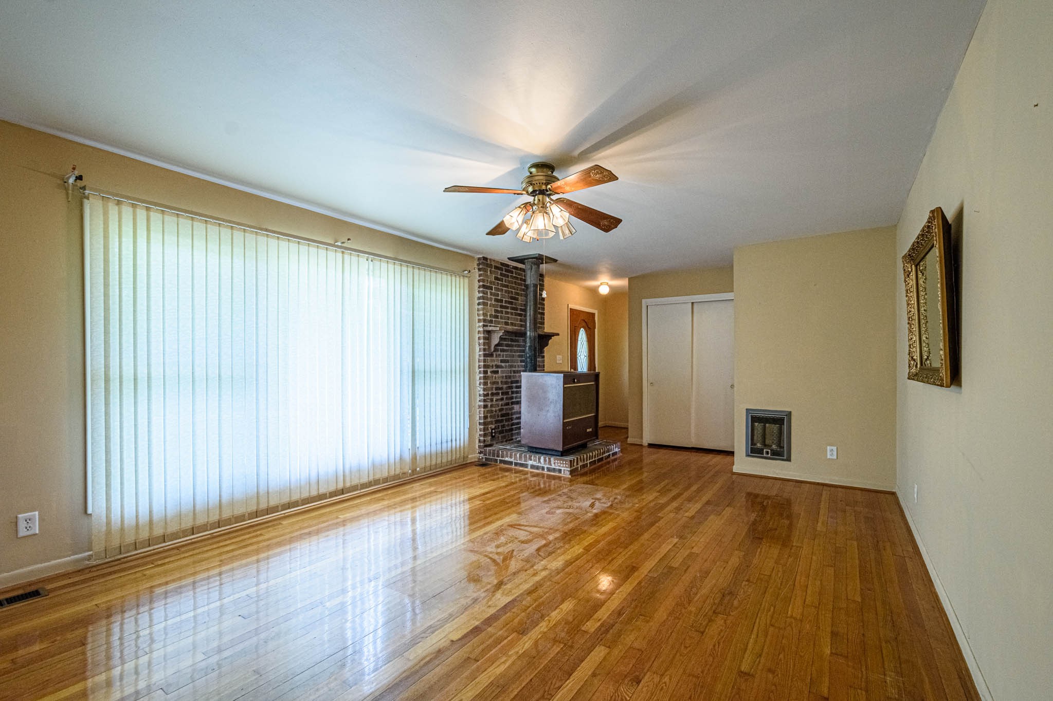 657 Prospect Road Pulaski, TN 38478 - Photo 17 of 50 wooden floor in an empty room with a window