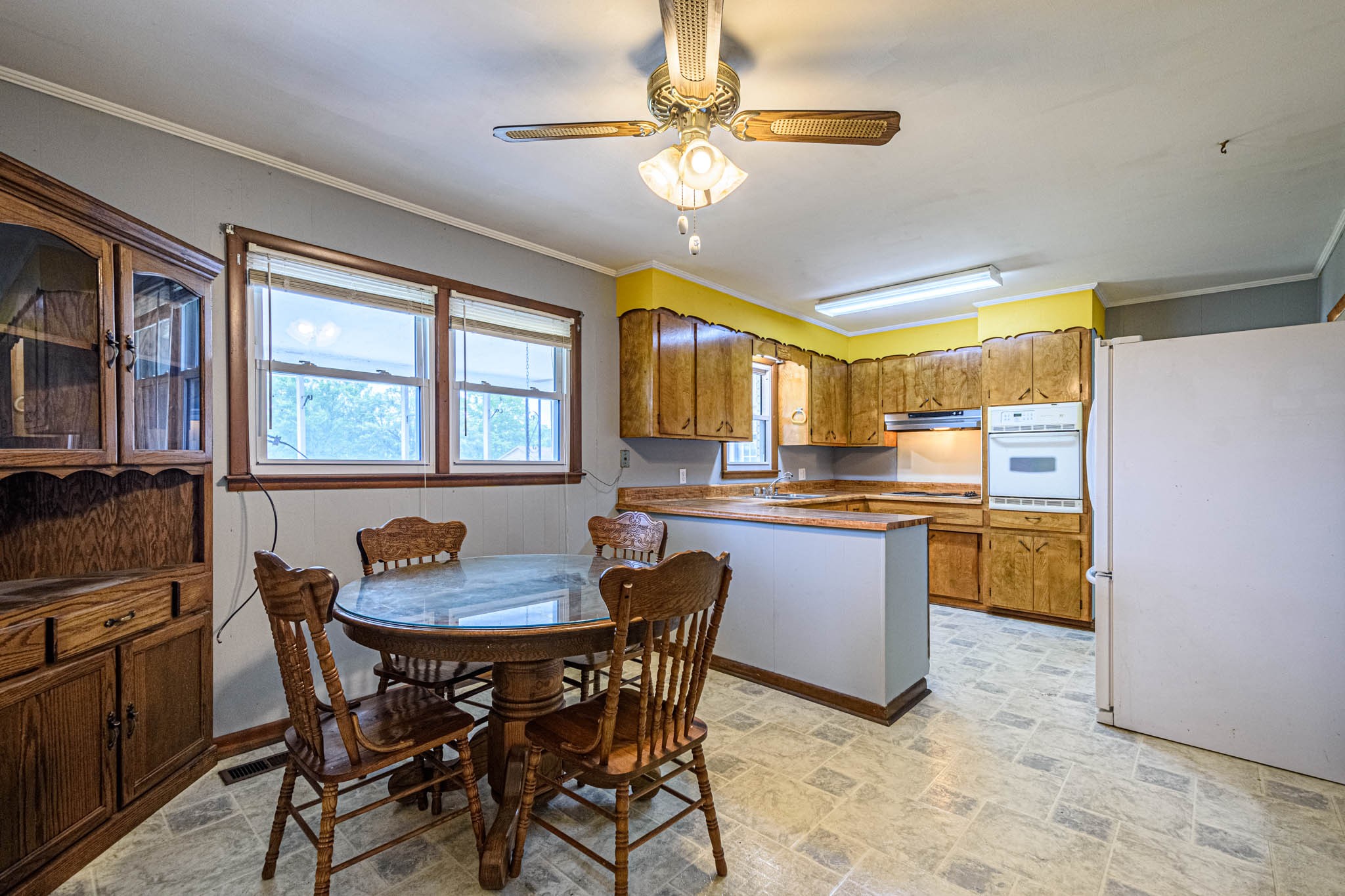 657 Prospect Road Pulaski, TN 38478 - Photo 21 of 50 a kitchen with a chandelier furniture and a dining table