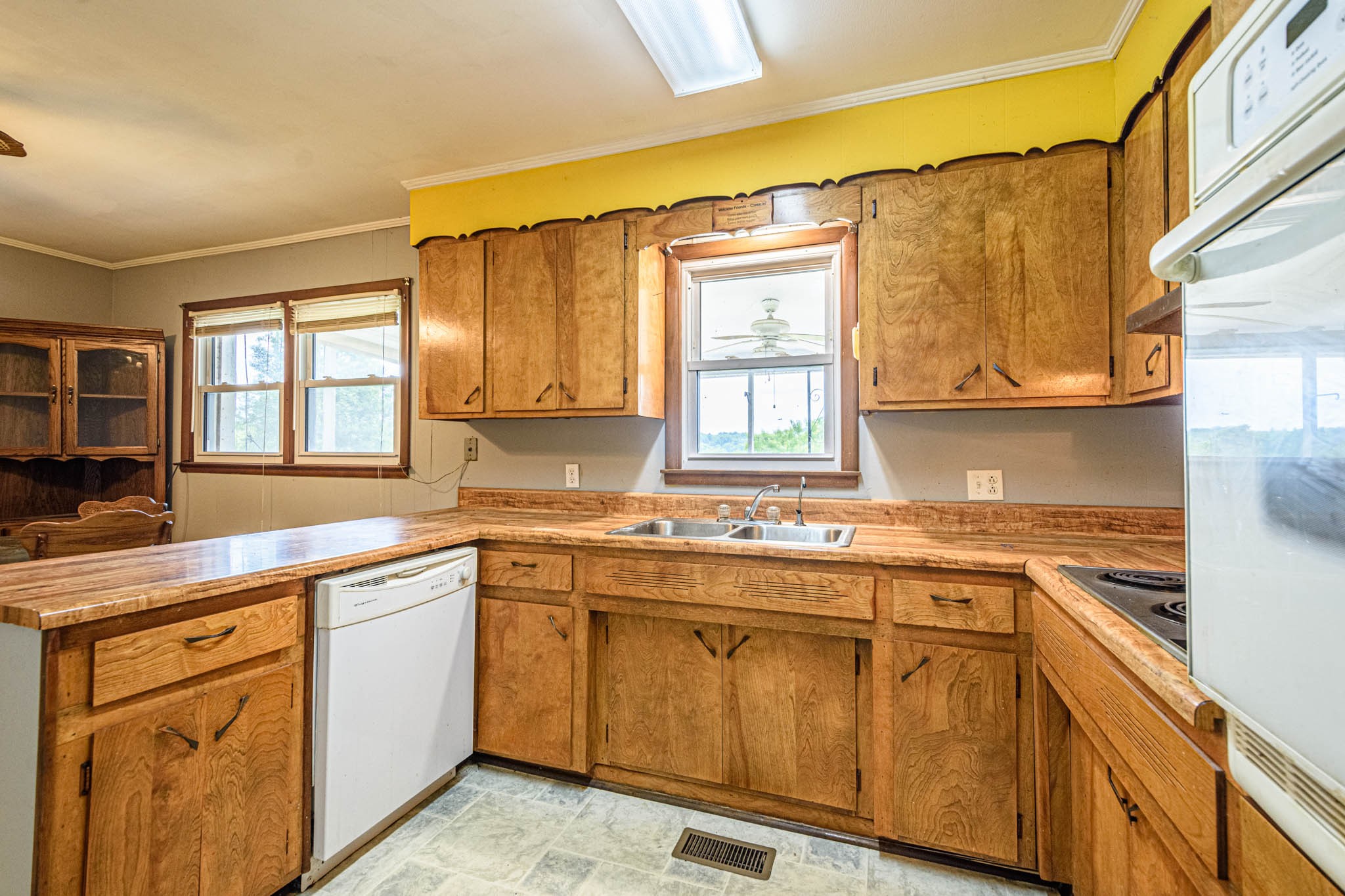 657 Prospect Road Pulaski, TN 38478 - Photo 26 of 50 a kitchen with a sink stove and cabinets