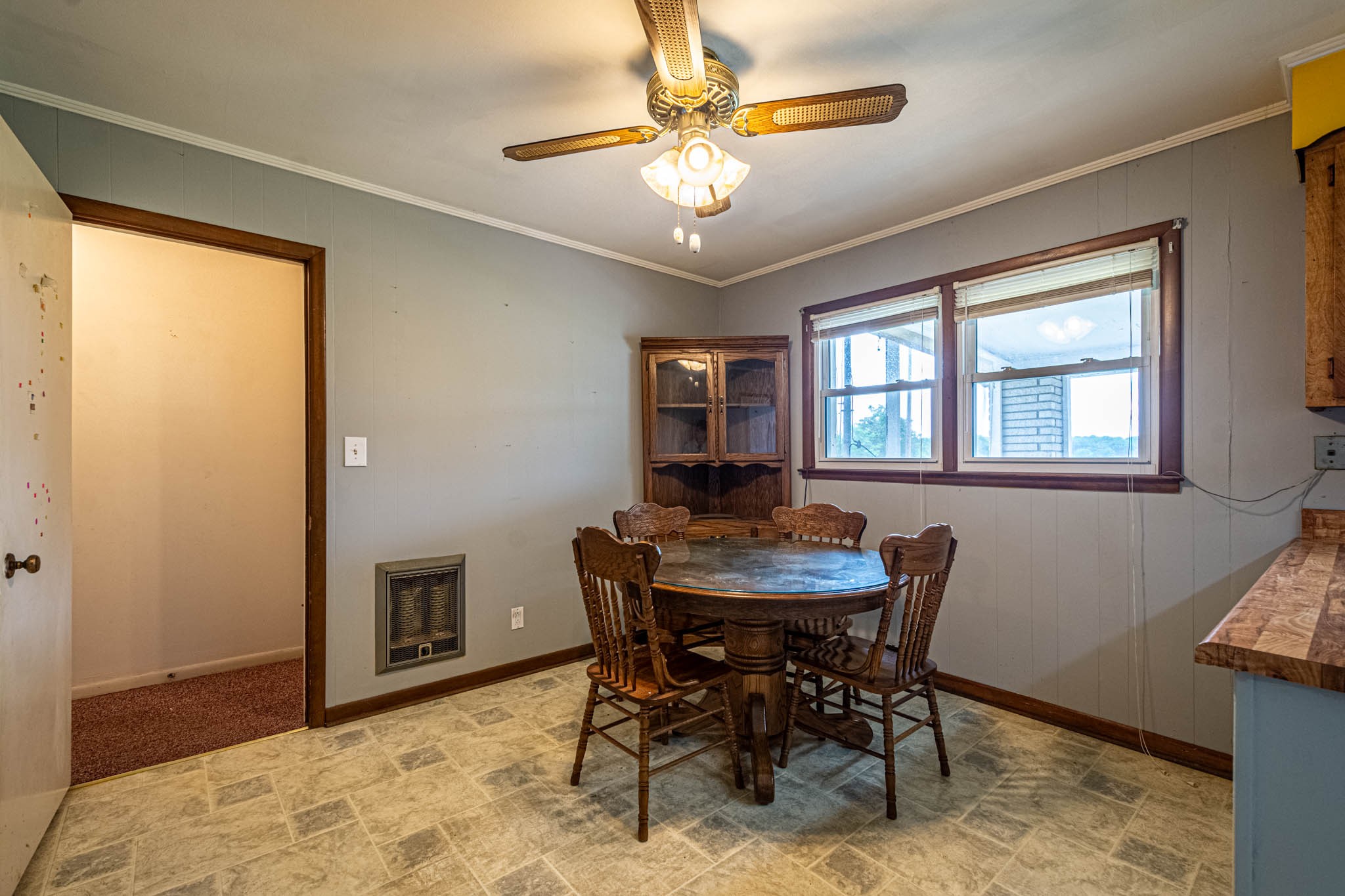 657 Prospect Road Pulaski, TN 38478 - Photo 27 of 50 a view of a dining room with furniture and chandelier