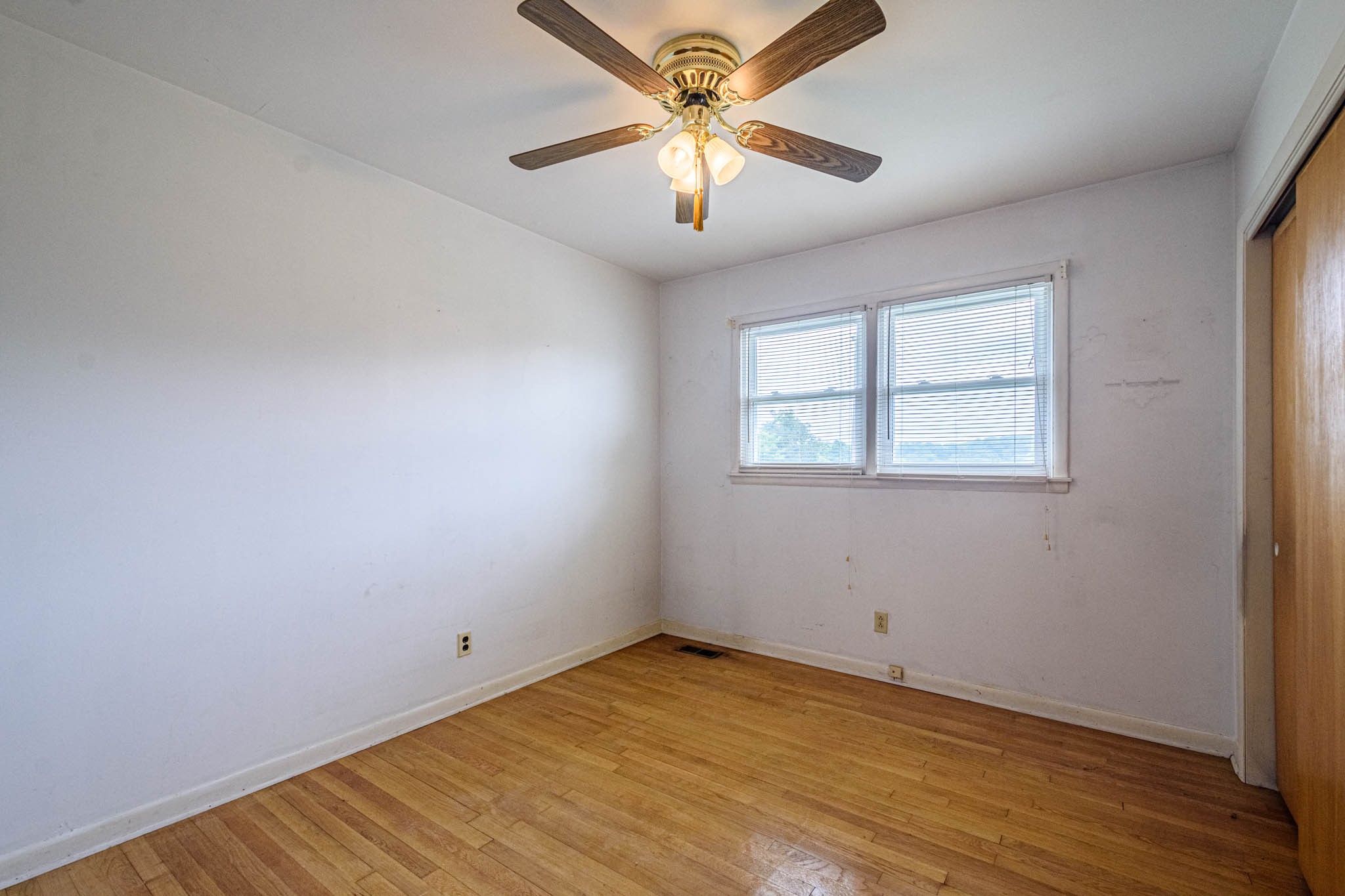 657 Prospect Road Pulaski, TN 38478 - Photo 28 of 50 wooden floor in an empty room with a window