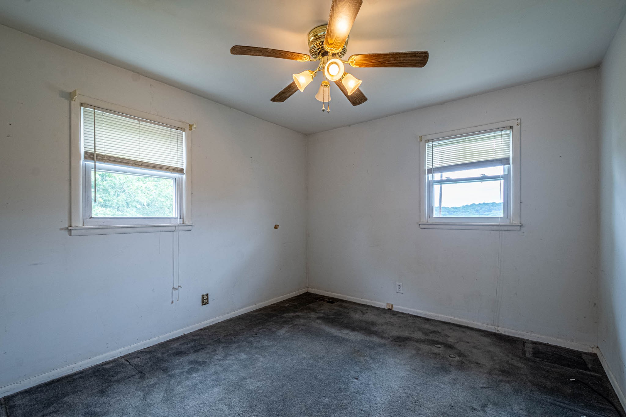 657 Prospect Road Pulaski, TN 38478 - Photo 31 of 50 an empty room with windows and fan