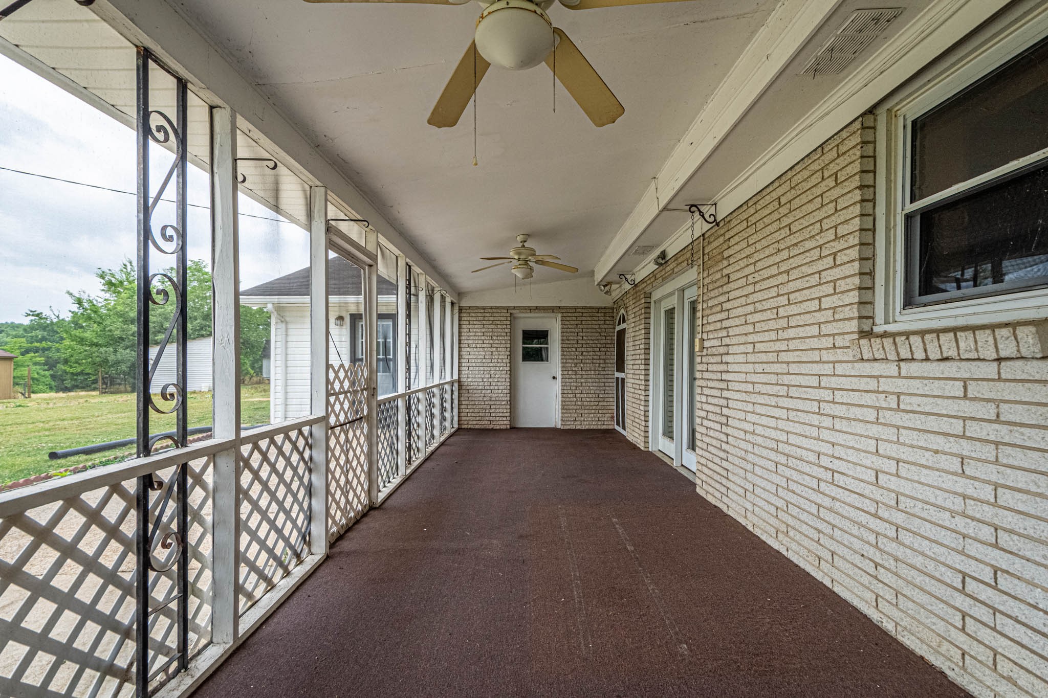 657 Prospect Road Pulaski, TN 38478 - Photo 44 of 50 a view of a porch with wooden floor and outdoor space