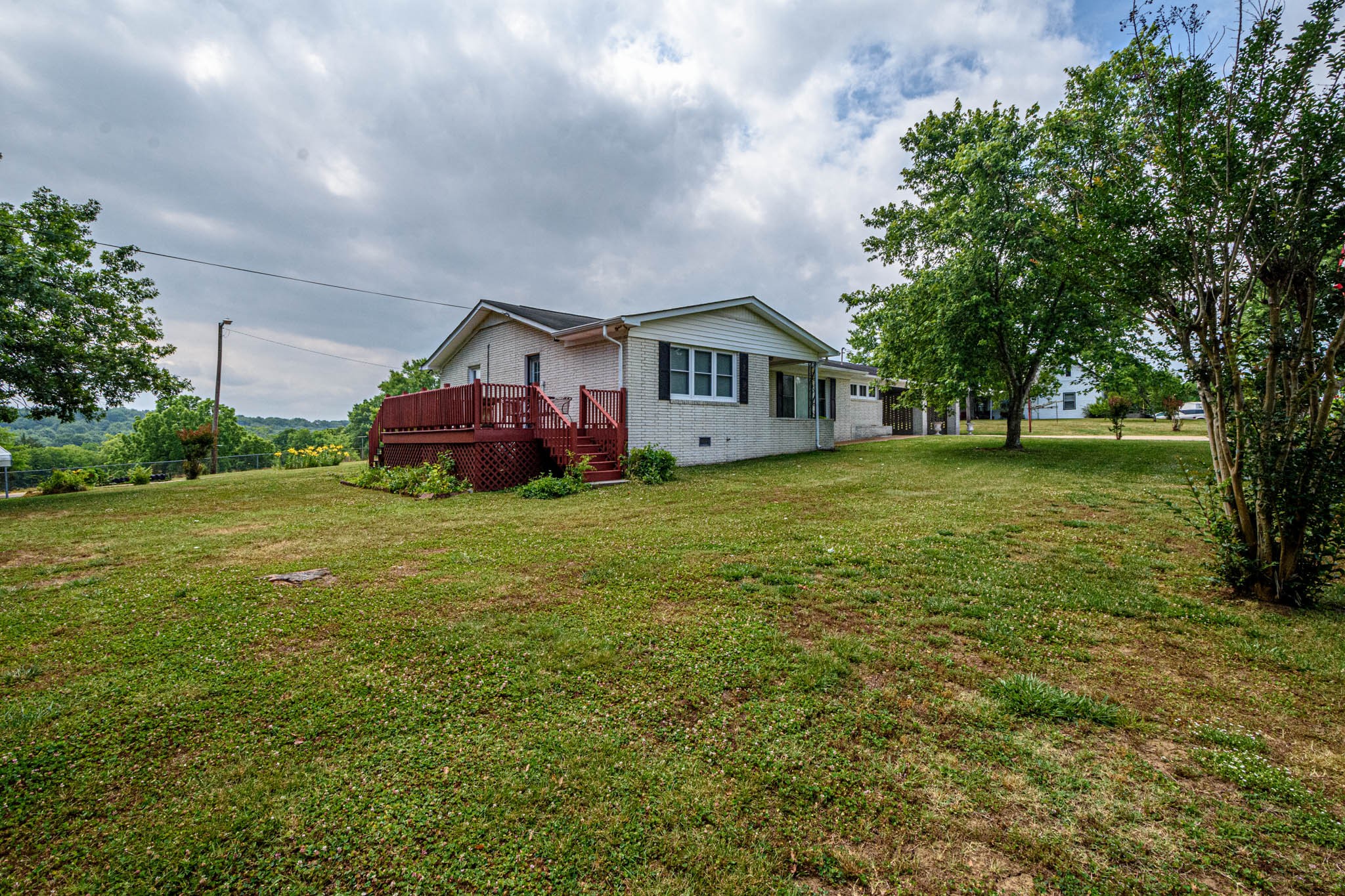 657 Prospect Road Pulaski, TN 38478 - Photo 6 of 50 a front view of a house with a yard