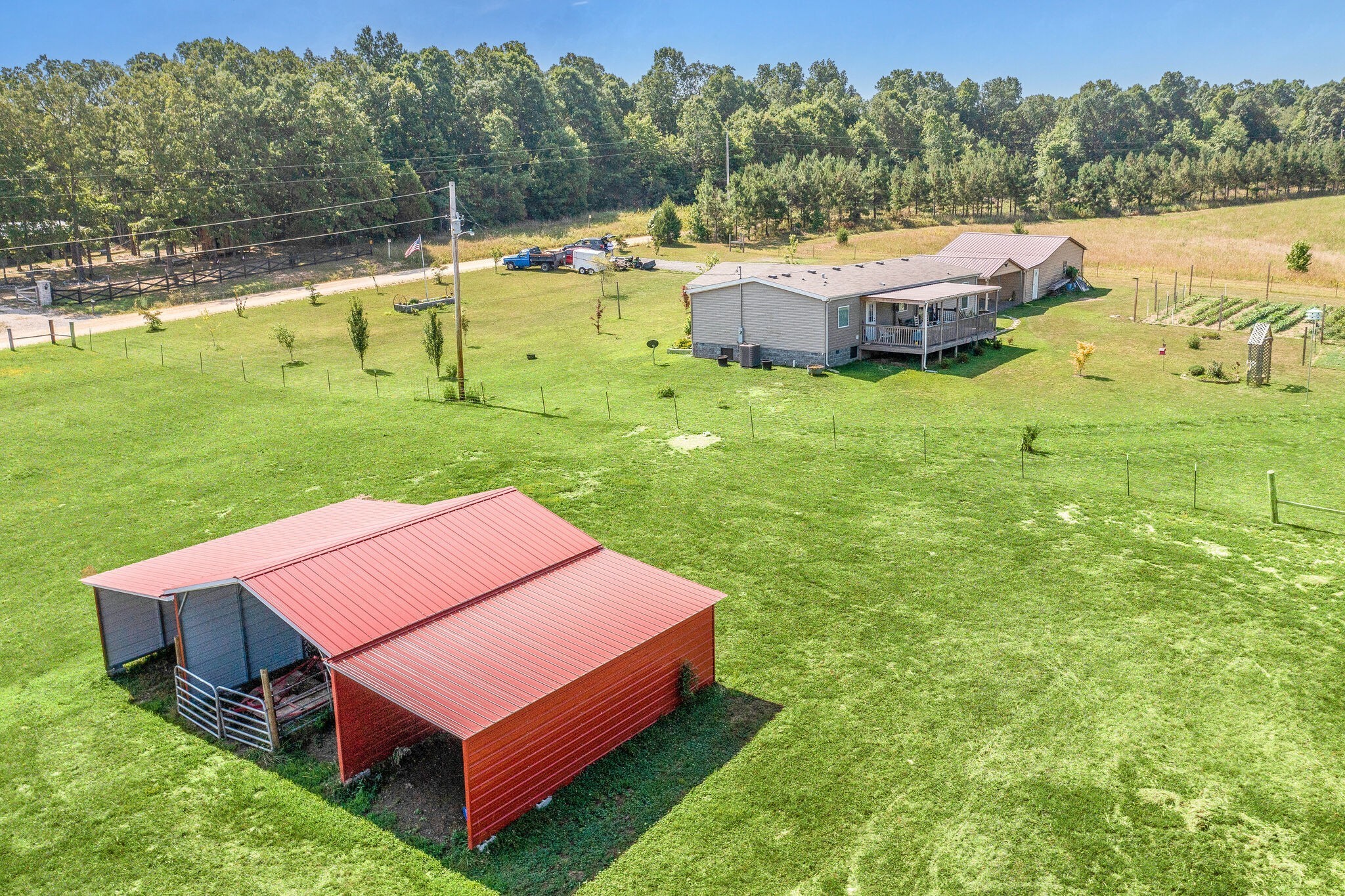 4585 West Tennessee City Road McEwen, TN 37101 - Photo 2 of 55 a view of a house with a big yard