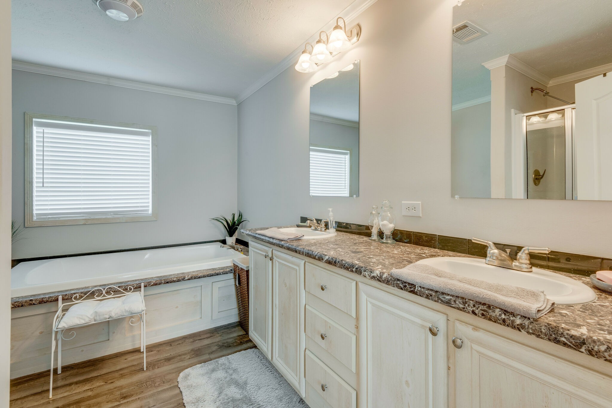 4585 West Tennessee City Road McEwen, TN 37101 - Photo 30 of 55 a bathroom with a granite countertop sink and a mirror