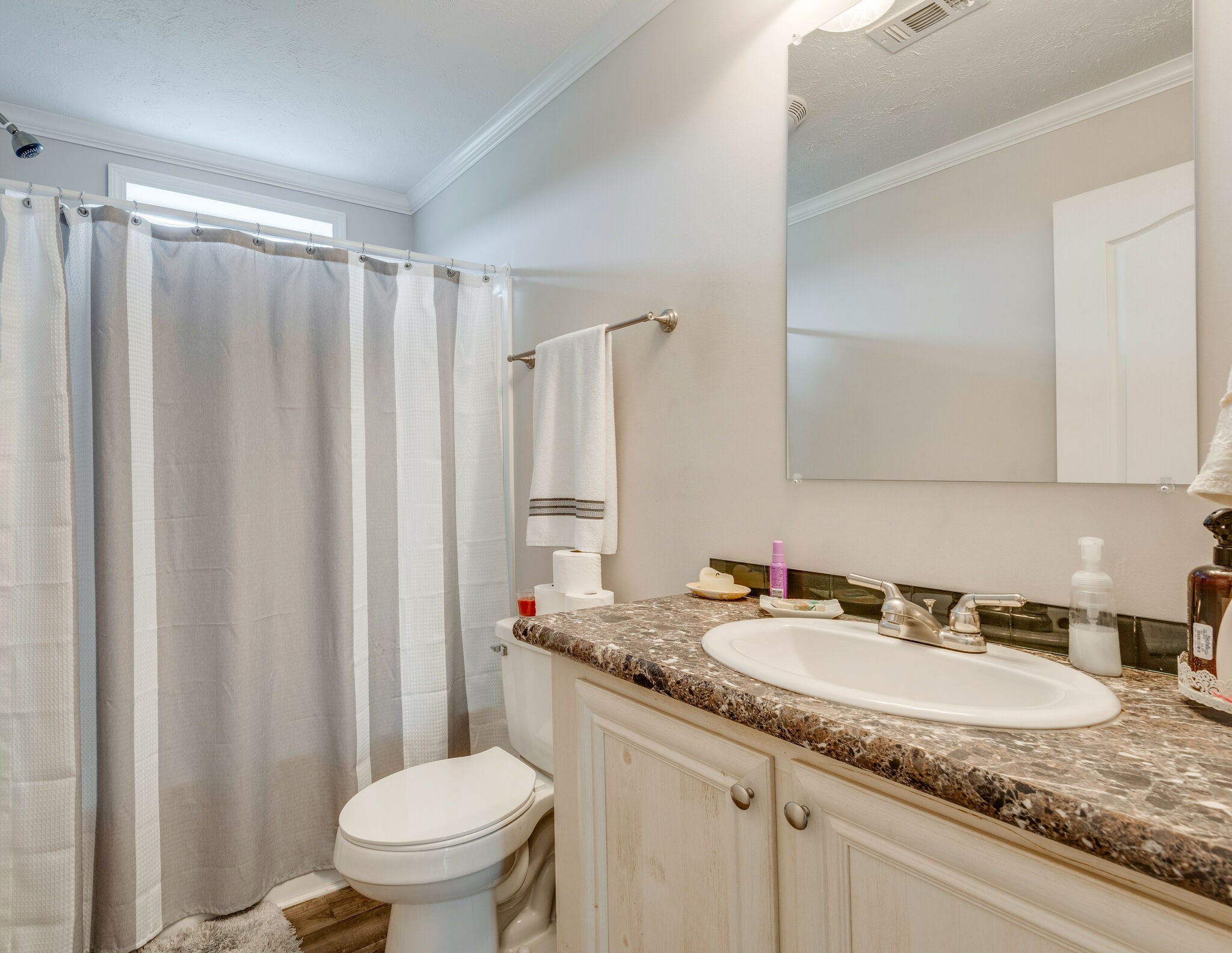 4585 West Tennessee City Road McEwen, TN 37101 - Photo 33 of 55 a bathroom with a granite countertop sink and a mirror
