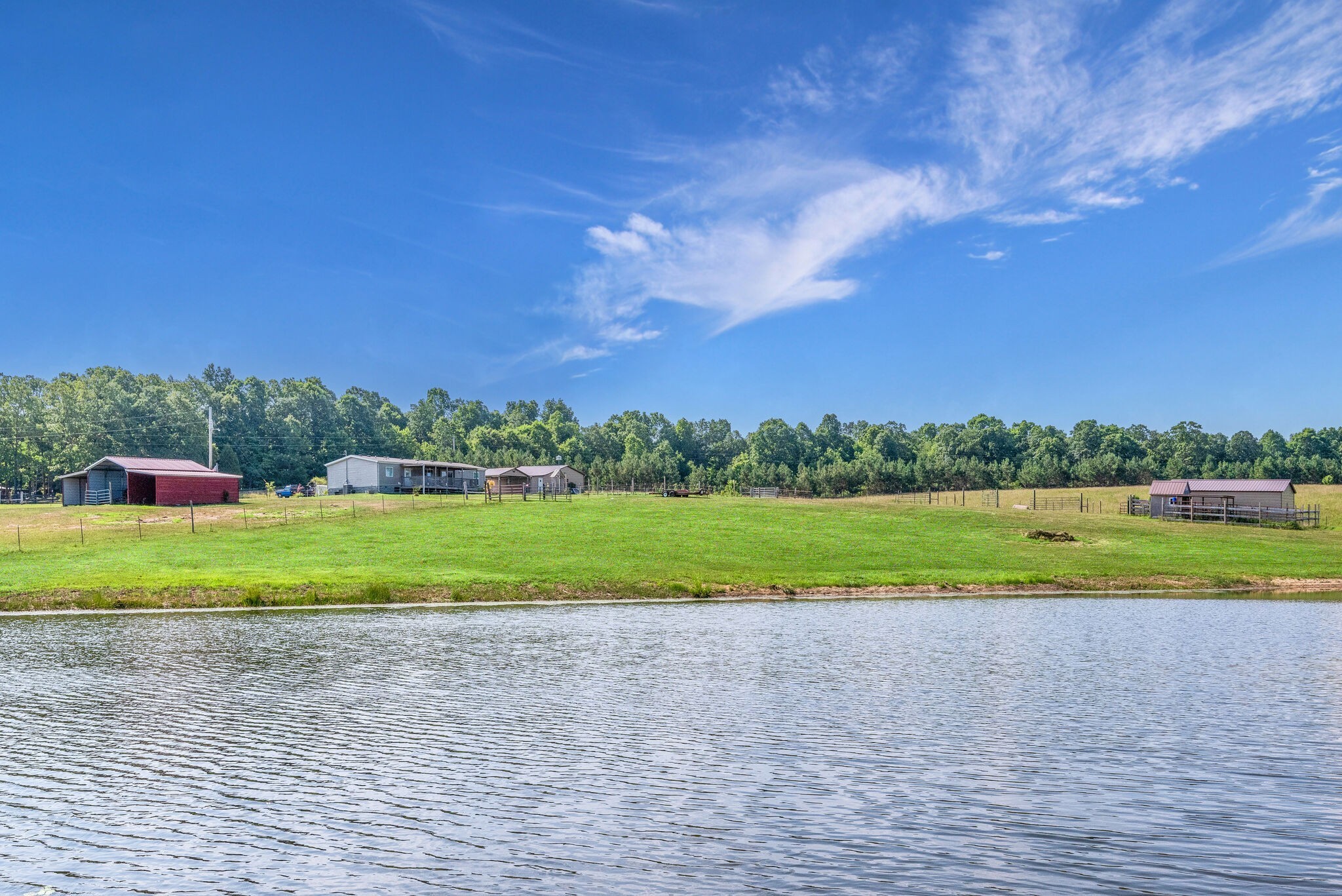 4585 West Tennessee City Road McEwen, TN 37101 - Photo 4 of 55 a view of a field and trees in the background