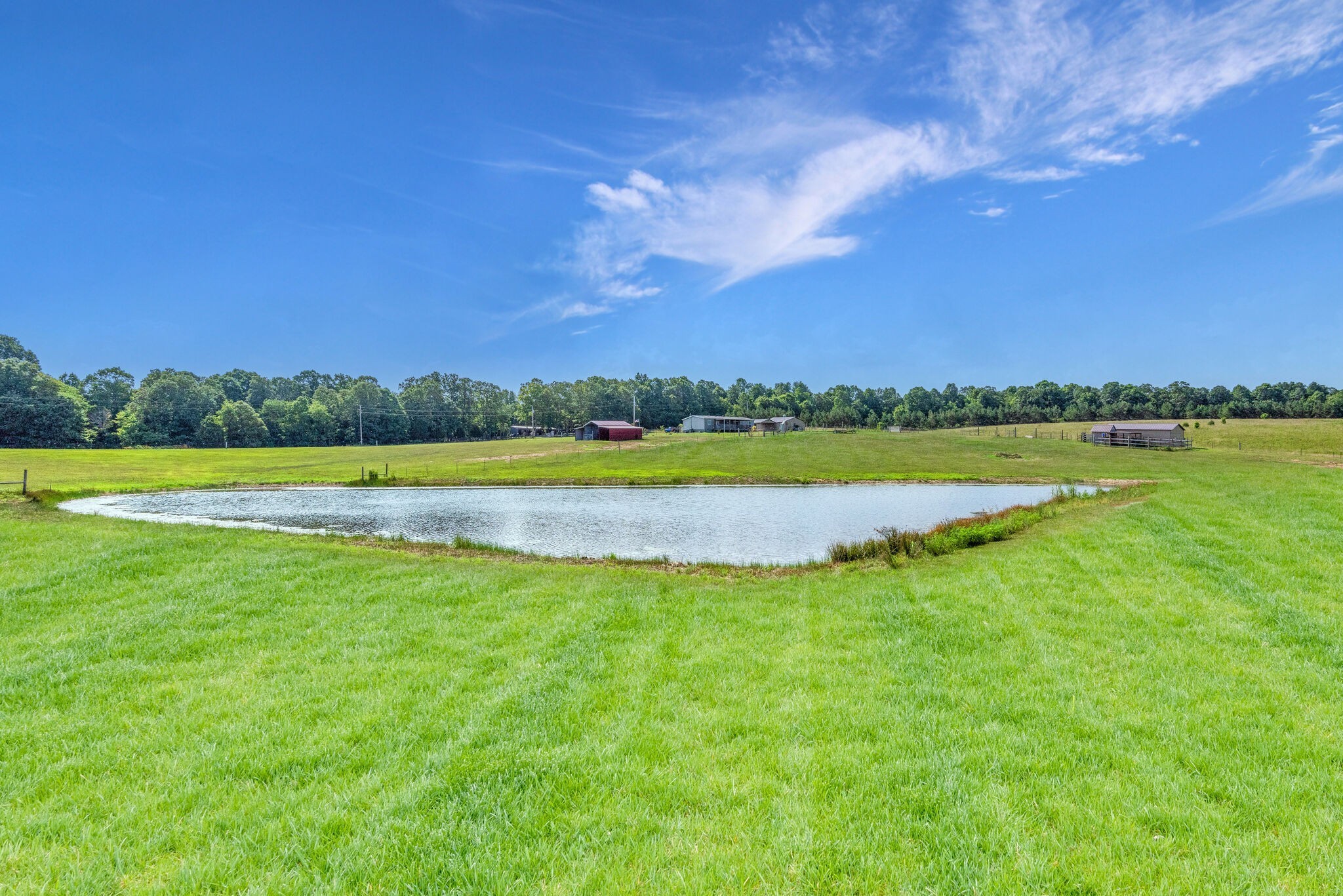 4585 West Tennessee City Road McEwen, TN 37101 - Photo 42 of 55 a view of a golf course with a lake view
