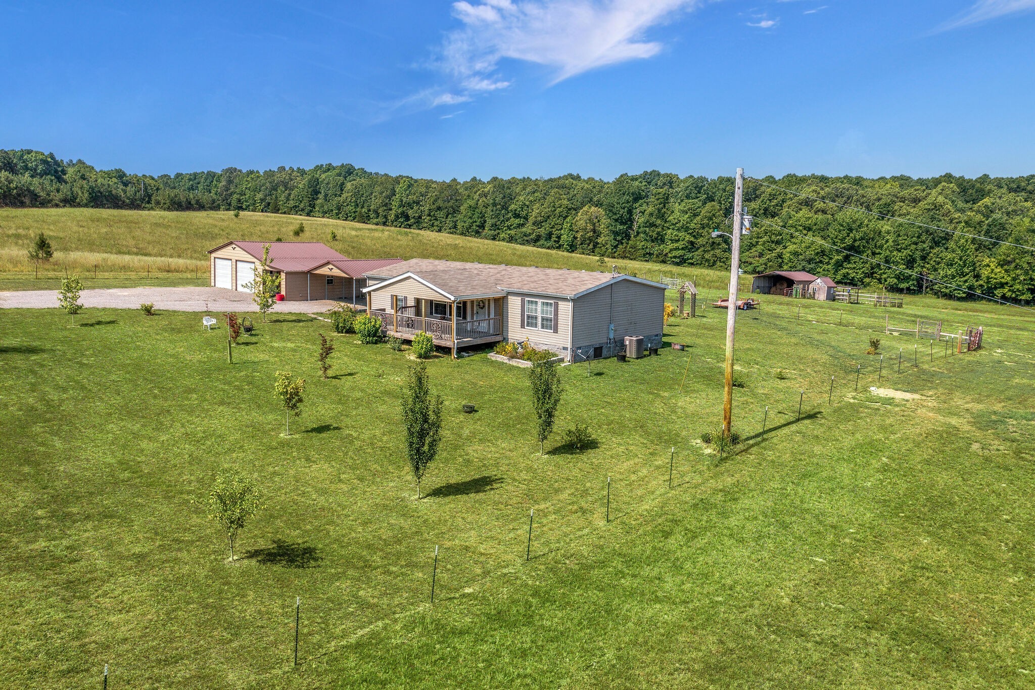 4585 West Tennessee City Road McEwen, TN 37101 - Photo 45 of 55 a view of a lake with a yard