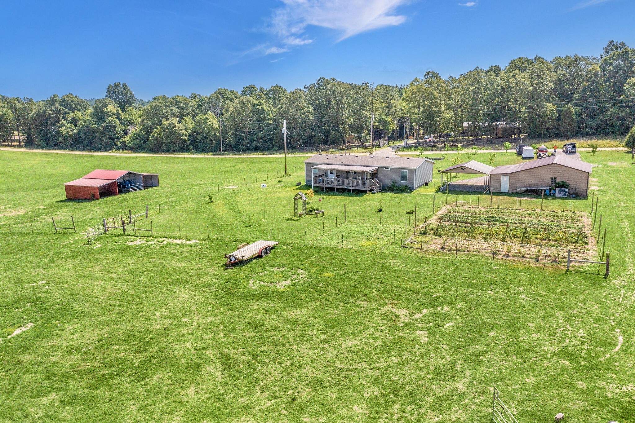 4585 West Tennessee City Road McEwen, TN 37101 - Photo 55 of 55 a view of a garden with an outdoor space and seating area