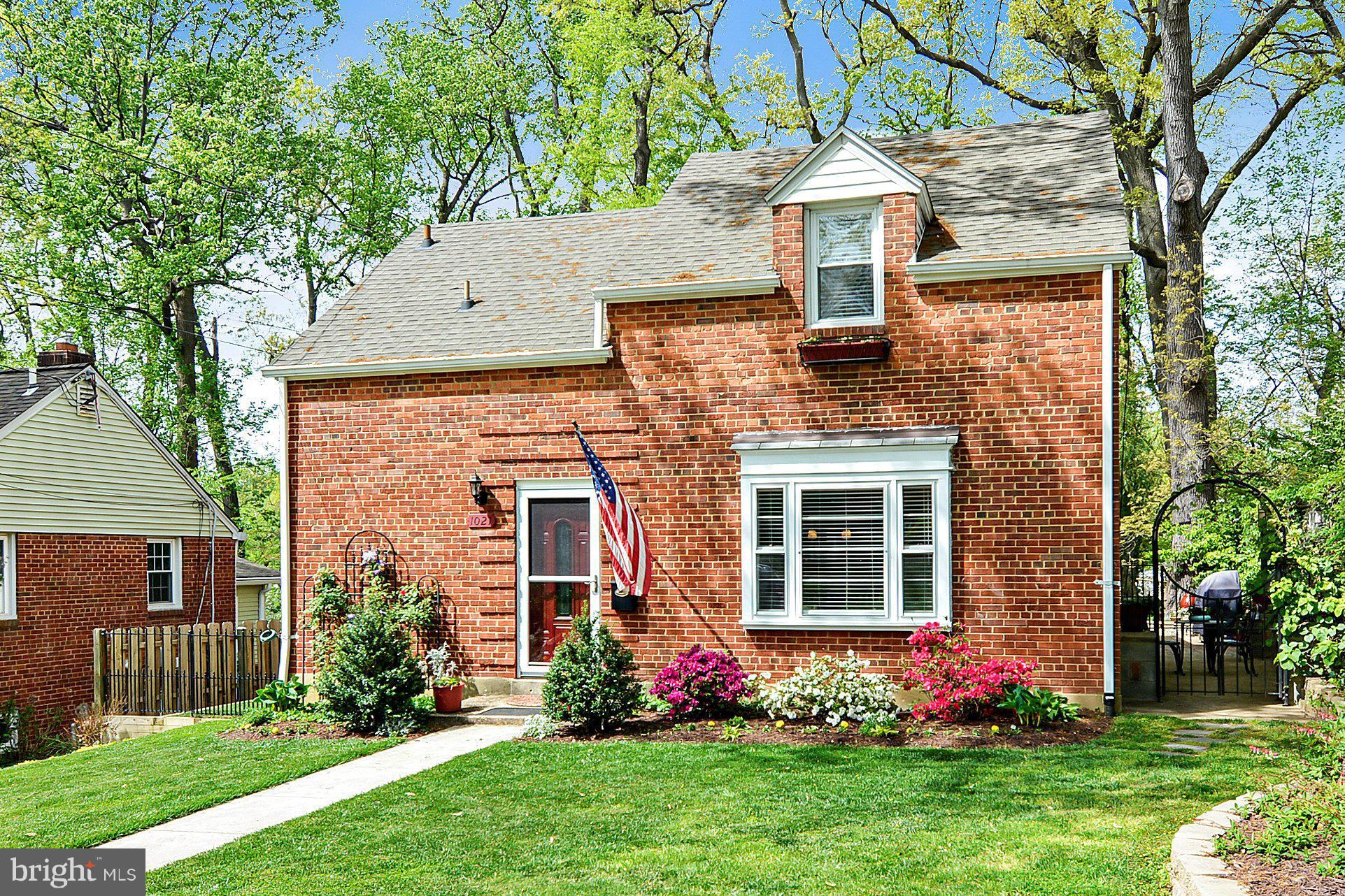 1021 Carson Street Silver Spring, MD 20901 - Photo 1 of 26 a front view of a house with garden