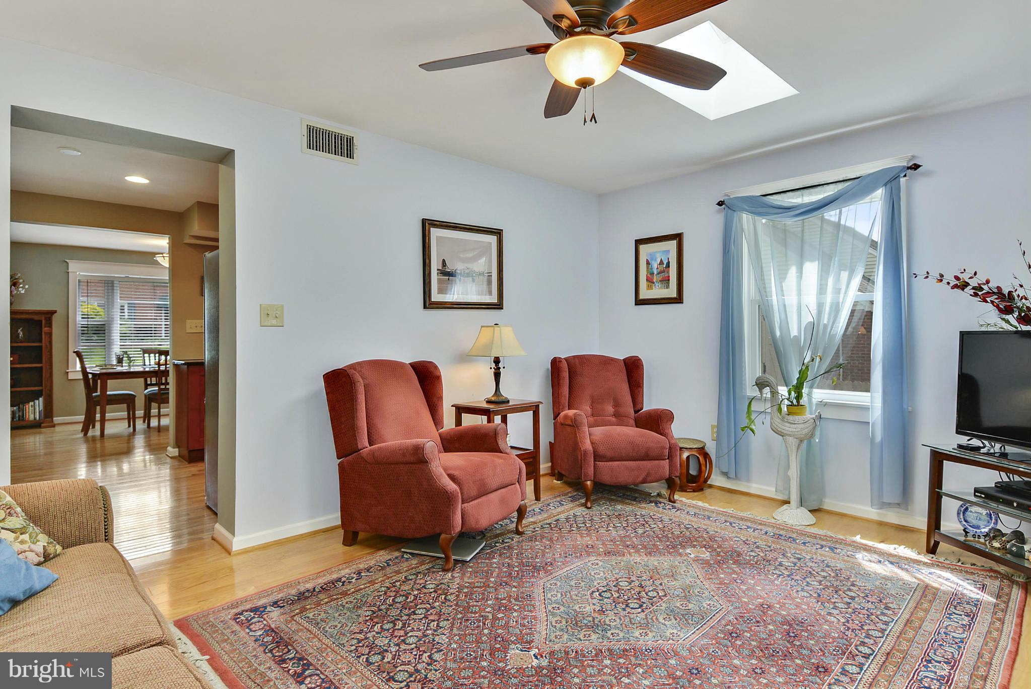 1021 Carson Street Silver Spring, MD 20901 - Photo 11 of 26 a living room with furniture and a flat screen tv