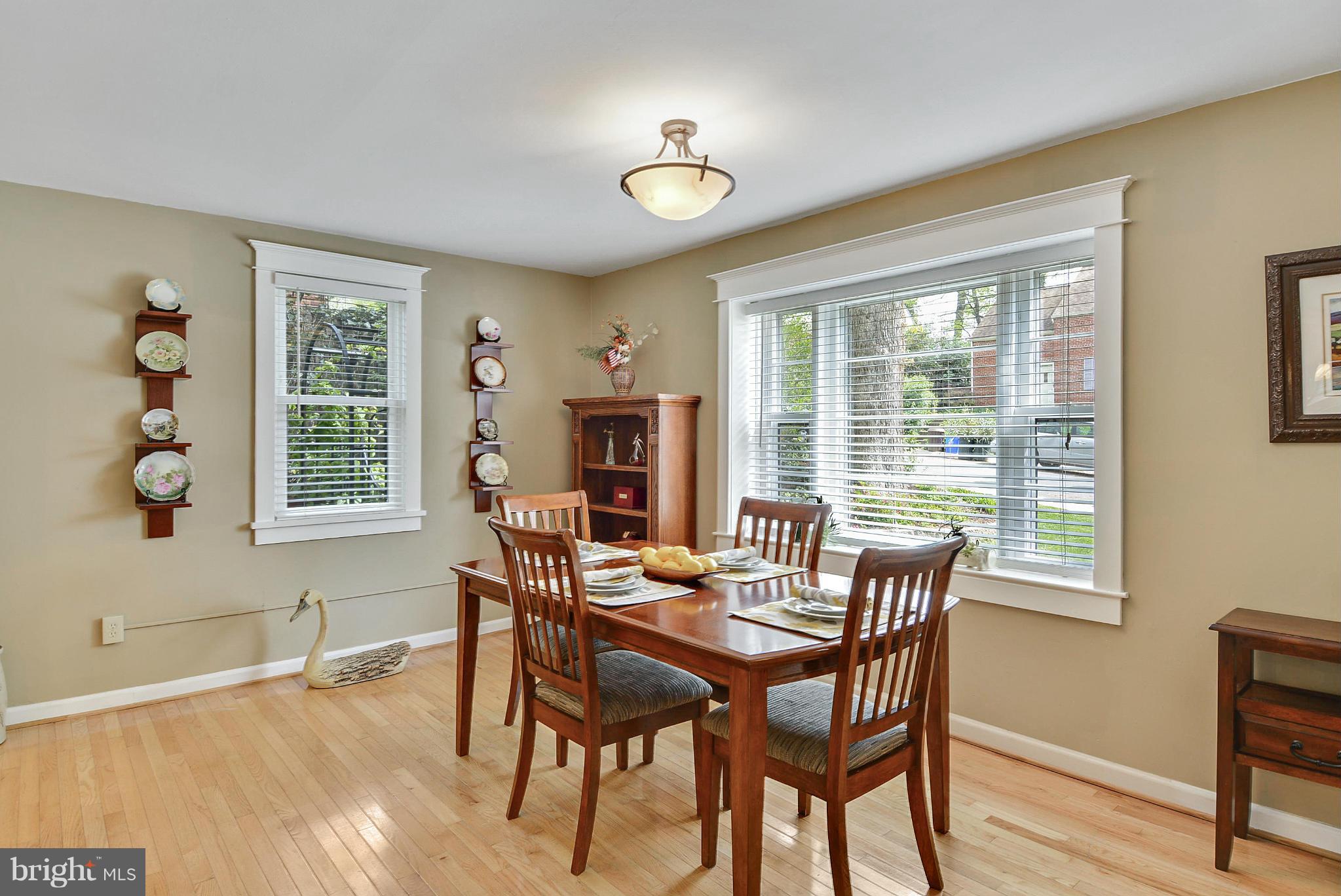 1021 Carson Street Silver Spring, MD 20901 - Photo 12 of 26 a view of a dining room with furniture and wooden floor
