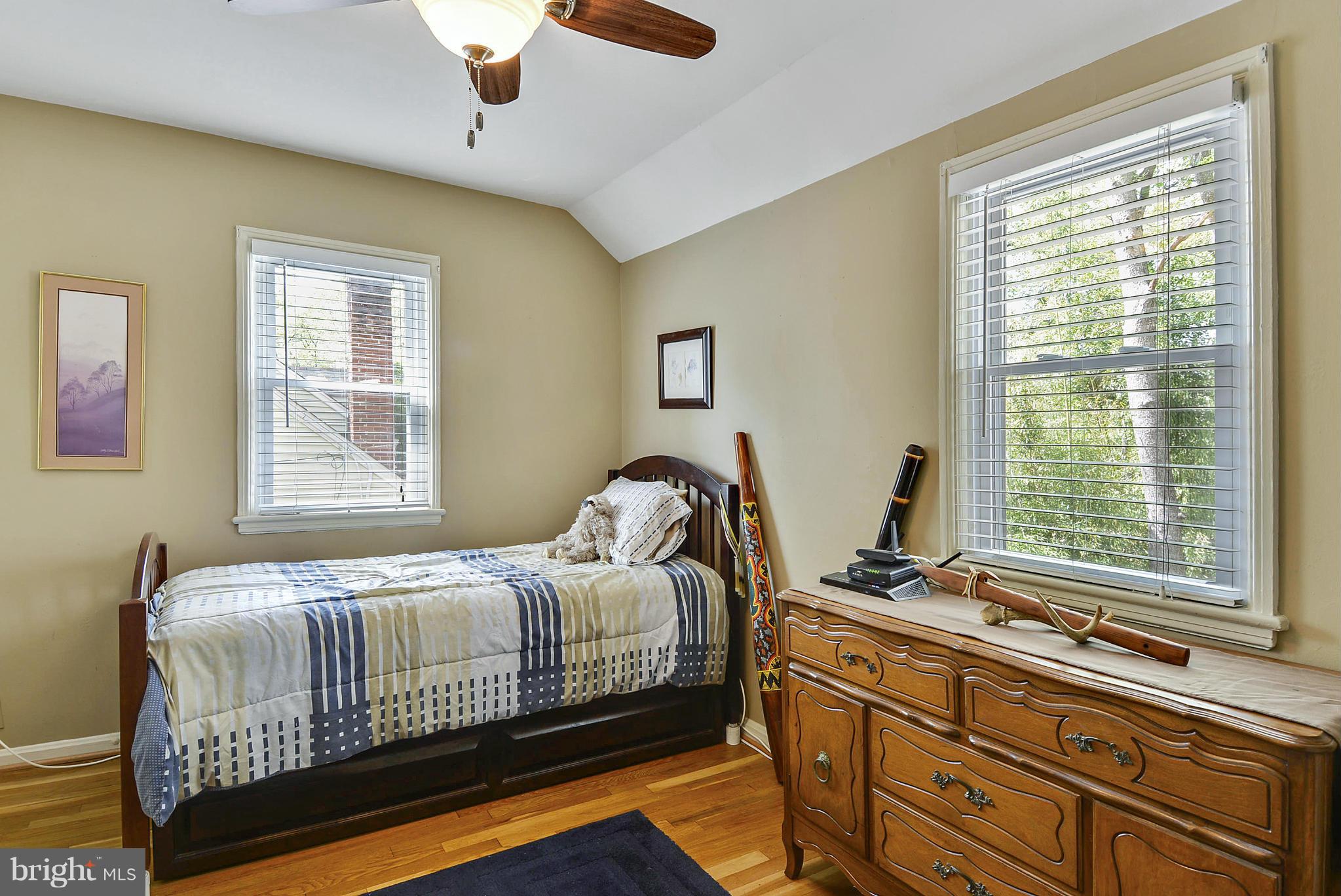 1021 Carson Street Silver Spring, MD 20901 - Photo 17 of 26 a bedroom with a bed and window