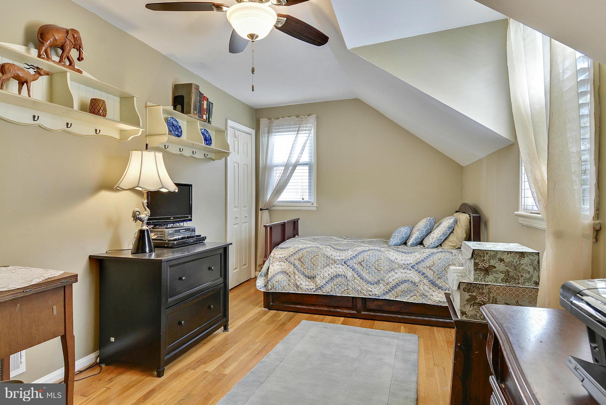 1021 Carson Street Silver Spring, MD 20901 - Photo 22 of 26 a bedroom with a bed and furniture