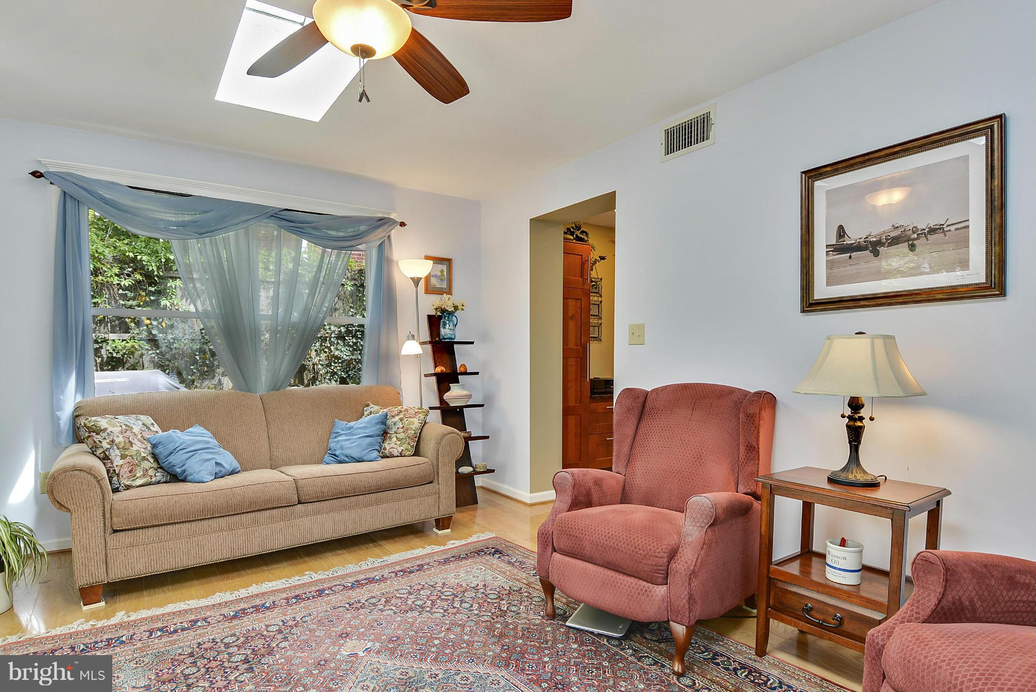 1021 Carson Street Silver Spring, MD 20901 - Photo 10 of 26 a living room with furniture and a large window
