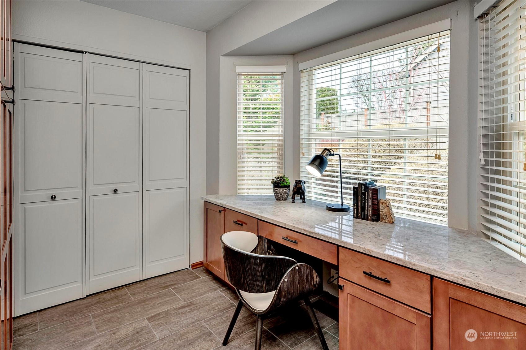 5300 Northeast 16th Street Renton, WA 98059 - Photo 12 of 38 a view of a kitchen with granite countertop cabinets table and chairs