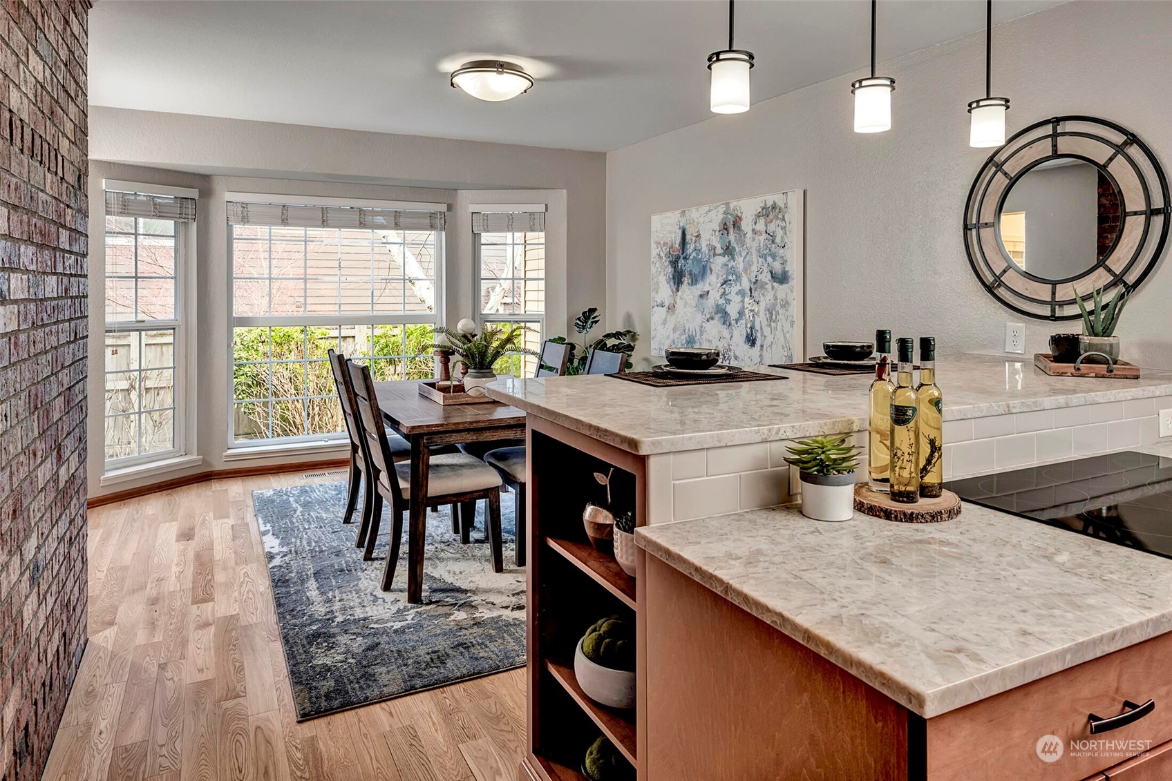 5300 Northeast 16th Street Renton, WA 98059 - Photo 14 of 38 a kitchen with a table chairs and window