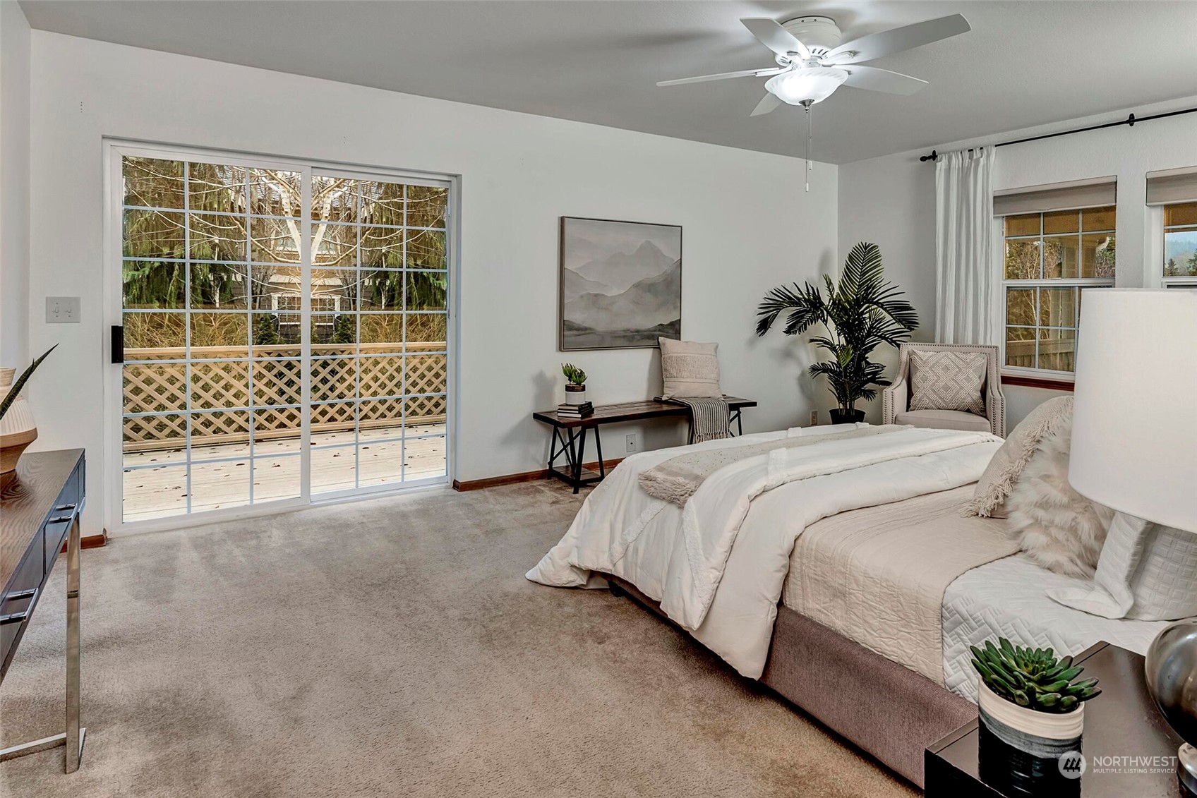5300 Northeast 16th Street Renton, WA 98059 - Photo 18 of 38 a bedroom with a bed potted plant and a window